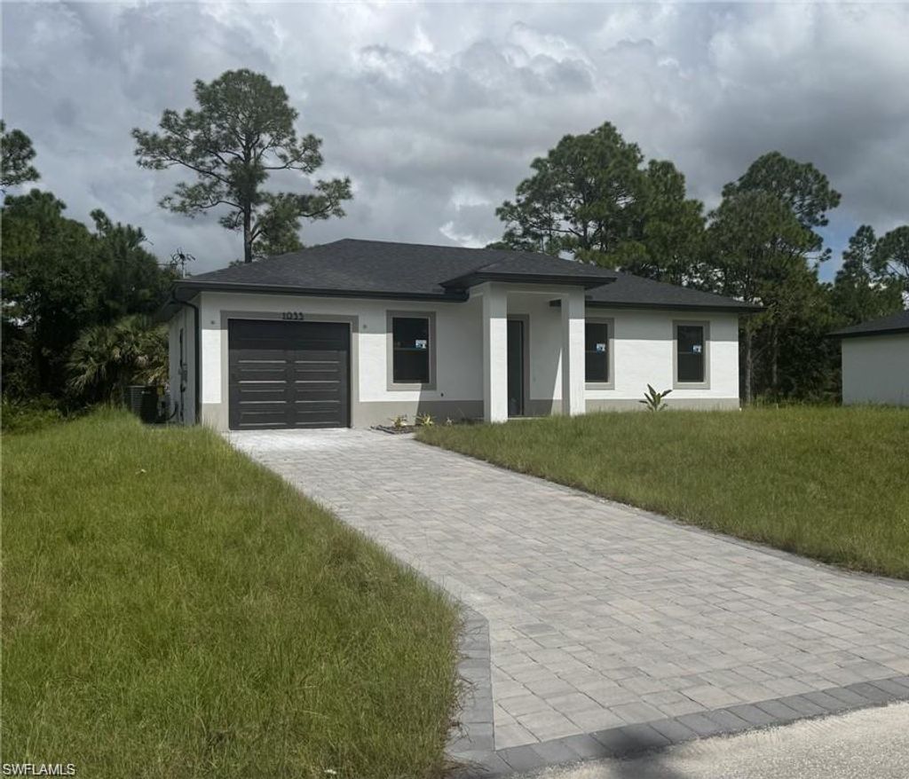 Photo of 1124 Cherry ST E, LEHIGH ACRES, FL 33974 (MLS # 226005278)