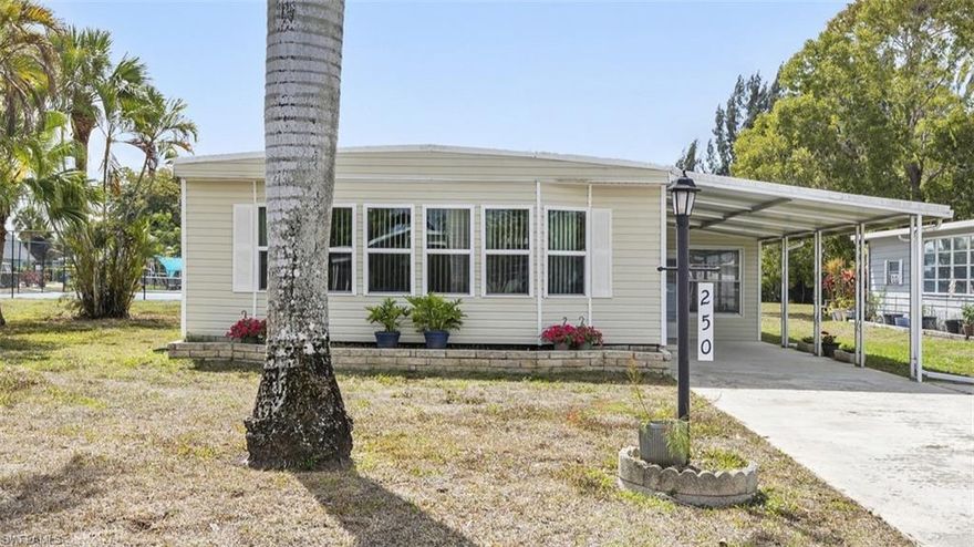 BIG open floor plan in this updated home with fresh paint and new floor coverings.  You’ll appreciate the huge living room plus a den/family room perfect for entertaining with its own WET BAR.  The master bedroom and bath are oversized and the 2nd bedroom has a full ensuite bath as well.  The home is choc full of storage with no less than 8 closets!  The lanai is also extra large with real windows and cooled by the central AC system.

The entire roof was replaced in 2017 with an EDPM roofing membrane which is expected to last 30+ years and comes with a transferable warranty.  The AC and water heater are practically new.  The home is protected by a Sentricon termite bait system with warranty included.  It also features a Wi-Fi compatible, programable lawn irrigation system and big, beautiful, mature palm trees.  

Other features include a 30 foot carport, long enough to protect your boat, and a double-wide drive for plenty of parking.  You can also keep a boat, RV, or other toys in the gated community storage lot for a very low fee.

Home is walking distance to the heated pool, huge clubhouse, and all the other great community amenities offered. West Wind Estates is a fun, pet friendly 55+ neighborhood with so many activities to keep you busy including pickleball, shuffleboard, corn hole, game nights, monthly brunches, and too many celebrations to mention.  You own the land and the community fees are a very low $125/mth.  No lot rent!!!  Home is located just 12 miles from either downtown Naples or Marco Island each with great beaches, restaurants, and shopping. Seller is a licensed real estate agent.