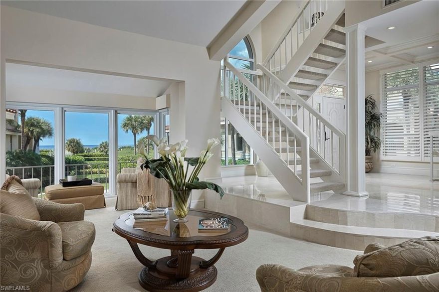 Rarely available and steps to the sugary sand of Park Shore beach, this villa is perfectly situated on the west side of Villa Mare with direct Gulf views. Nicely renovated with neutral finishes throughout, residents will not only appreciate the modified floor plan with enclosed lanai space but also the convenient elevator and both eastern and western facing lanais. Ideal for entertaining, the three bedrooms plus a den layout allows for several places to gather while also providing privacy for guests. The terrace level has a charming pathway directly to the community pool which is beautifully landscaped and the perfect place to soak up the sun. Villa Mare is a unique gated, dog-friendly community offering the best of a condominium while living like a single-family home on the beach and with views like this, it will not last long.