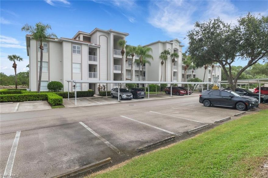 Welcome to your dream condo in the highly sought-after Naples Heritage, a beautifully landscaped, gated, bundled golf community just minutes from 5th Avenue and the beaches! This top-floor unit offers peace, privacy, and panoramic views of the water, golf course, and lush nature preserve. The building includes elevator access, and the condo itself features an open floor plan with durable porcelain plank tile flooring throughout. Stylish updated lighting and ceiling fans add a modern touch, while hurricane-impact windows and Storm Smart hurricane screens on the lanai provide both comfort and security. The kitchen is beautifully renovated with white shaker cabinets, granite countertops, a glass tile backsplash, and newer stainless steel appliances. A charming eat-in nook includes a cozy window seat that looks out over the water and golf course. Custom window shades in the kitchen offer both style and function. The spacious primary bedroom includes a walk-in closet with a built-in safe. The en-suite bath has been updated with a sleek new vanity and a custom-tiled walk-in shower with a frameless glass door. Step out onto the screened lanai and enjoy peaceful views of the water, golf course, and preserve – the perfect spot to unwind. Additional perks include deeded covered carport parking and an extra-large private storage room. Naples Heritage offers a true resort lifestyle with an 18-hole championship golf course, putting green, driving range, renovated clubhouse with pro shop, resort-style pool, tennis courts, pickleball, bocce, and a fully equipped fitness center with trainers and group classes. You’ll also enjoy the convenience of a poolside cabana and bar. More than a home – it’s a lifestyle! Don’t miss your chance to own in one of Naples’ premier bundled golf communities.
