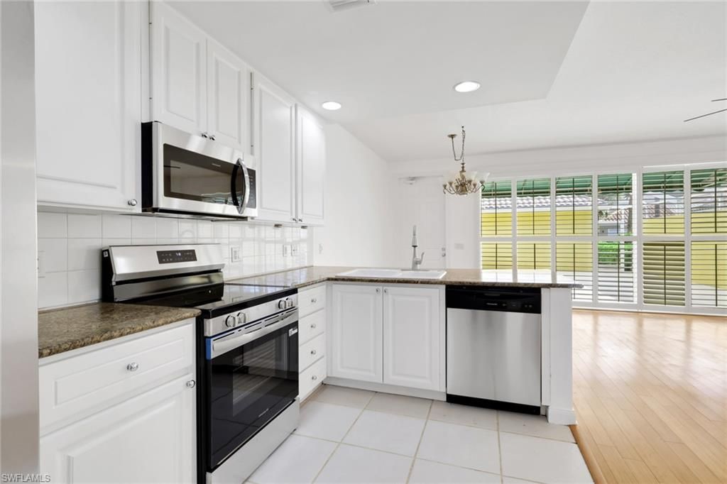 Photo of 6284 Towncenter CIR, NAPLES, FL 34119 (MLS # 226019561)