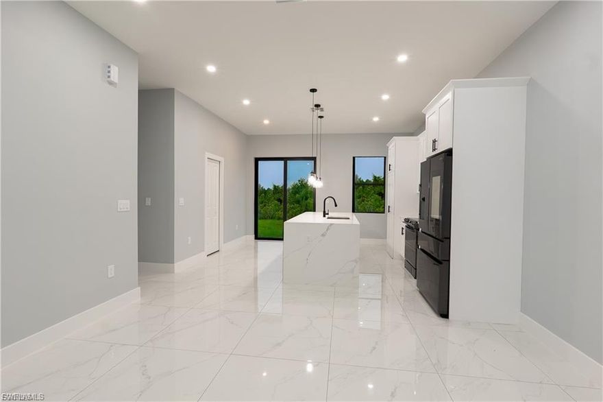 This beautiful home offers 3 bedrooms and 3 bathrooms, all featuring elegant porcelain tile flooring throughout. Property is on a dead end road