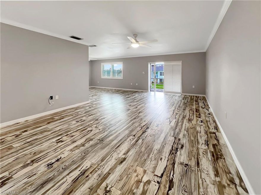 Where do we even begin with this beautifully updated 2-bedroom, 2-bath condo offering over 1,200 square feet of living space? Maybe it’s the incredible location, quietly nestled along the Caloosahatchee River. Or perhaps it’s the impact windows, crown molding, and plantation shutters found throughout.

Welcome to 3366 N Key Drive #E7 in Bay Harbor Club, where serene waterfront living meets modern comfort.

Step inside and you’re immediately greeted by a spacious great room that flows seamlessly to the screened lanai with slate tile flooring, overlooking the community courtyard and offering gorgeous river views—the perfect place to relax and enjoy Southwest Florida’s unforgettable sunsets.

Throughout the home, you’ll appreciate the durable, easy-maintenance flooring made from composite granite material imported from Germany. The kitchen is both stylish and functional, featuring stainless steel appliances, granite countertops, Maple wood cabinetry with dovetail drawers, pantry, wine and glass rack, and a striking Abalone shell backsplash. A rollaway island adds flexibility, while the expanded pass-through window opens to the dining area, making entertaining effortless.

The primary suite easily accommodates a king-sized bed and features a walk-in closet, private bath with updated vanity and bowl sink, and a walk-in shower. Guests will enjoy a comfortable bedroom with convenient access to the hall bath, complete with an updated vanity and tub/shower combination with custom glass door.

Additional upgrades include popcorn ceilings removed throughout, updated fans with remotes, modern light fixtures, updated electrical switches and receptacles, custom kitchen doors concealing the washer/dryer and pantry, and custom guest closet doors. NEW 2 TON AC INSTALLED IN 2025, with 10 year warranty on parts/labor, whole house surge protector, UV light, plus sanitation of all ductwork/equipment.

And yes—this unit also includes a deeded oversized one-car garage, a rare and valuable feature.

Bay Harbor Club is a 55+ pet-friendly community offering a heated pool, cabana, grilling area, fishing pier, and a beautifully landscaped central courtyard—all overlooking the river.

You’ll also love the walkable location, just steps from local favorites like Nauti Parrot Tiki Hut, Sabor a Mexico, Three Fishermen, Daddy Dee’s Ice Cream, and Marina Town. Just across the bridge is the historic Downtown Fort Myers River District, known for its boutique shopping, dining, theater, and popular events like Art Walk, Music Walk, and Bike Night.

Your opportunity to enjoy peaceful riverfront living with unbeatable convenience awaits.

Schedule your private showing today.