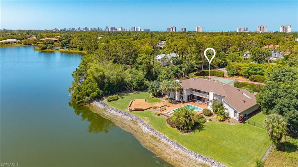 Photo of 154 Cajeput DR, NAPLES, FL 34108 (MLS # 225034376)