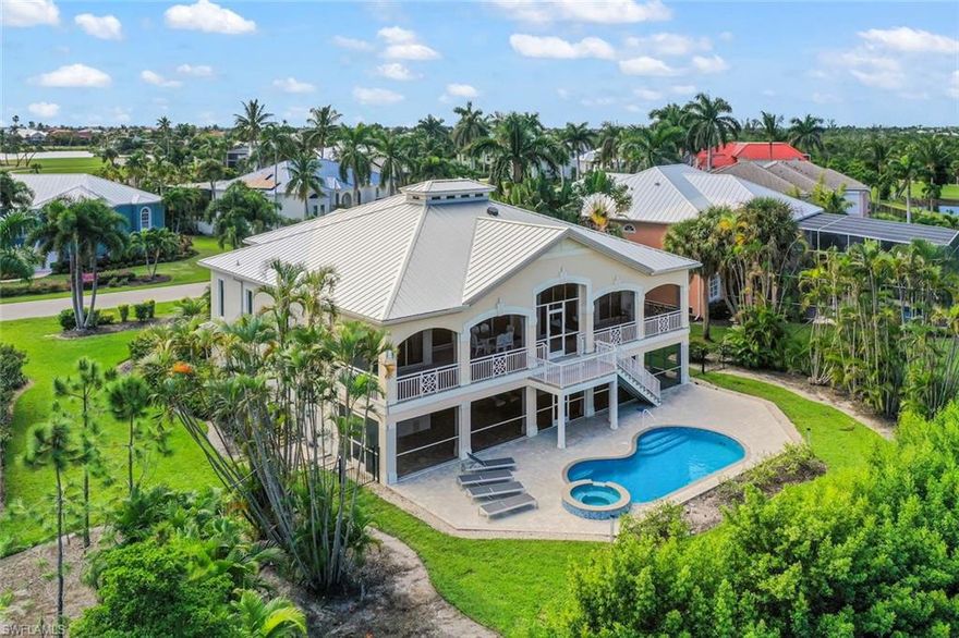 Welcome to a slice of island elegance at 824 Birdie View Point, Sanibel. This captivating elegant home, built in 2002, offers 2,363 sq ft of air-conditioned comfort and a total of 7,857 sq ft including garage, storage and outdoor decking/patio/pool spaces. Enjoy stunning golf course views from the minute you step inside, where a grand Great Room with soaring ceilings greets you.

The home features a remarkable primary suite, 2 spacious guest ensuite bedrooms, and a bright and open den creating plenty of comfortable  spaces for enjoying life! Porches on both the front and rear of the home provide wonderful space ideal for entertaining or relaxation. The Den and 2nd guest bedroom open to private balconies. The kitchen boasts granite countertops and stainless steel appliances, with a convenient island and breakfast bar for casual dining.

For the car enthusiast or storage seeker, an oversized garage accommodates four vehicles, and there's plenty of lower-level storage. The pool and spa, paired with a large veranda, offer a perfect retreat. Enjoy outdoor living sitting by the pool or playing a game under the covered patio. The community provides deeded beach access and tons of opportunities for involvement in local organizations and events. Located just 40 minutes from RSW Airport and only 15 minutes to Fort Myers, yet feeling worlds away,combining serenity and convenience.