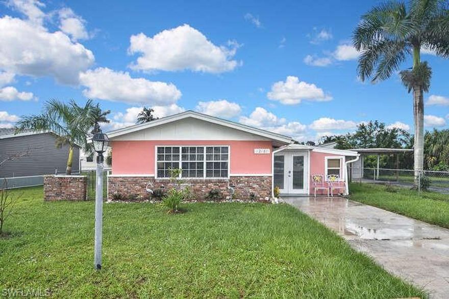 Welcome to this solid concrete home located in a no HOA deeded community.  EVERYTHING, from top to bottom, has been reconstructed, or replaced since in Hurricane Ian.  The wide open floor plan is well lit with natural light and a vaulted ceiling.  The HVAC is accomplished with a 3-zone mini-split system.  The home has a good rental history, as it is close to the beach and many other SWFL attractions.  The optional $350 annual HOA allows use of the community pool and small clubhouse.  The backyard is fully fenced and has a sizable out-building, with electricity.