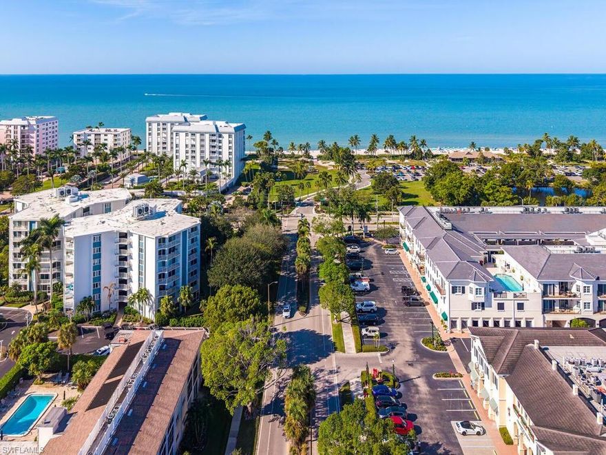 Light and bright top floor condo with sparkling pool in Coquina Sands. Great location close to all that Naples has to offer and just steps to Lowdermilk Beach Park. This end unit condo has lots of windows to let in the light and been updated to reflect it's coastal location. Desirable upgrades include: open kitchen with stainless steel appliances and quartz countertops, updated baths, wood look flooring throughout, plantation shutters, hurricane rated windows and doors, glass lanai, extra storage, underbuilding parking and room for a washer and dryer. Calusa Club is a small community of just 19 residents with a lovely heated saltwater pool. Additionally Calusa Club features new landscaping, refinished pool, new pool equiptment and the building has updated electrical and plumbing . Great location on Naples "Miracle Mile"!