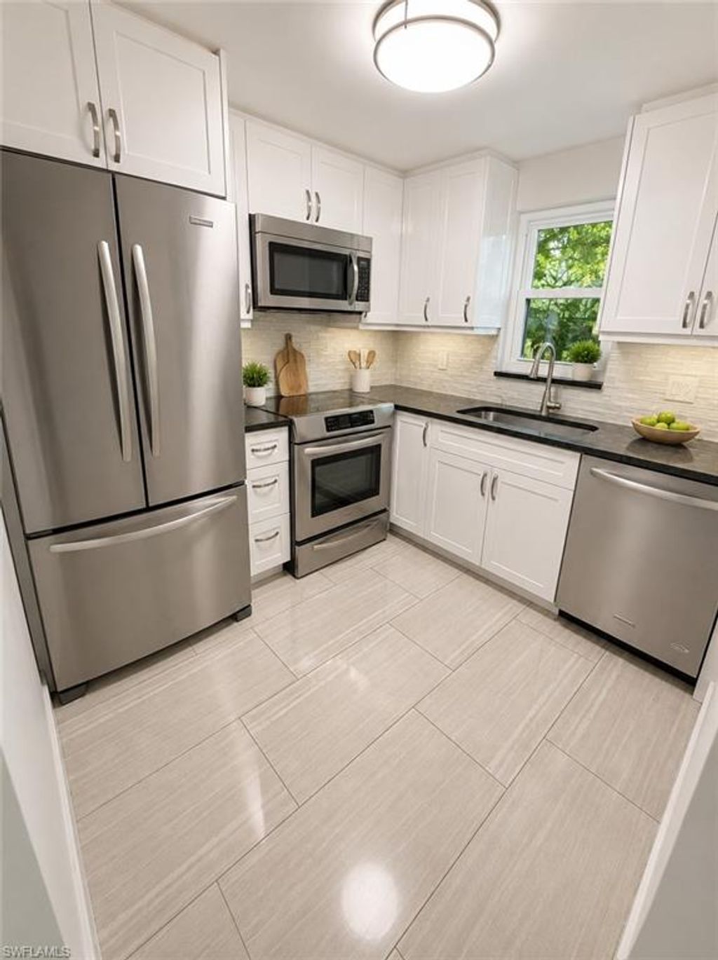 Photo of 1440 Green Valley CIR #601, NAPLES, FL 34104 (MLS # 226021077)