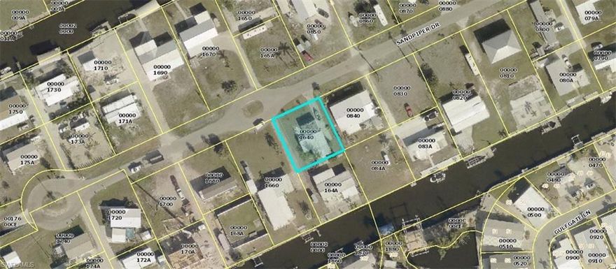 Priced as a lot. Buyer is responsible for removing destroyed mobile home from hurricane IAN. Volunteer Association to use boat ramp, pool and clubhouse is $275.00 per adult per year.