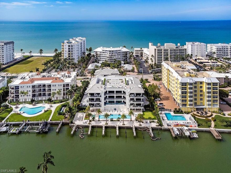 New Construction Bayfront!  Luxuriously furnished and decorated residence representing the epitome of coastal elegance and offering panoramic views of Hurricane Harbor and includes deeded boat slip with large pets are welcome. Step off the elevator into your private foyer that opens into this stunning 3-bedroom haven, each bedroom boasting its own en suite bath for ultimate privacy. The residence radiates elegance, from the Legno Bastone white oak flooring to the selection of exquisite fixtures. The gourmet kitchen is a culinary enthusiast's dream and is equipped with high end Wolf & Sub-Zero appliances. Spectacular outdoor amenities include a geothermal heated pool with sun shelves and lap lane, heated spa, two cabanas for grilling and relaxing and an inviting putting green. Enjoy sunsets and social gatherings at the rooftop courtyard. La Perle, built to transcend time, has emerged as a coveted sanctuary in a prime location conveniently located near Naples' illustrious shopping and dining venues, including Venetian Village, Waterside Shops and Lowdermilk Park. A short drive or bike ride to Old Naples and 5th Avenue ensuring La Perle’s residents enjoy the best of Naples' lifestyle.