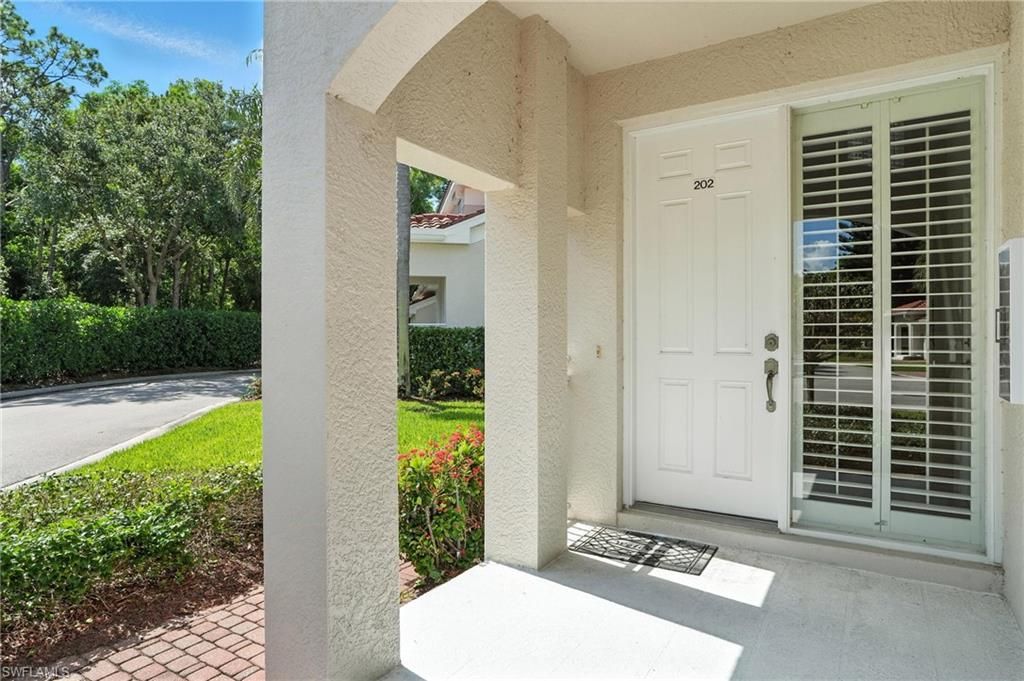 Photo of 700 L&#39; Ambiance CIR #202, NAPLES, FL 34108 (MLS # 225059018)