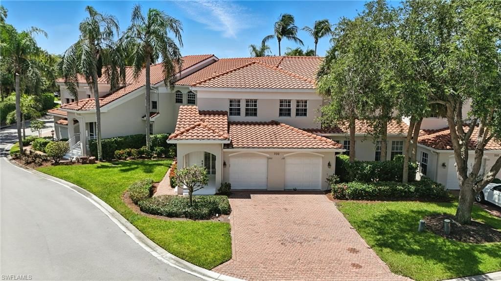 Photo of 700 L&#39; Ambiance CIR #202, NAPLES, FL 34108 (MLS # 225059018)