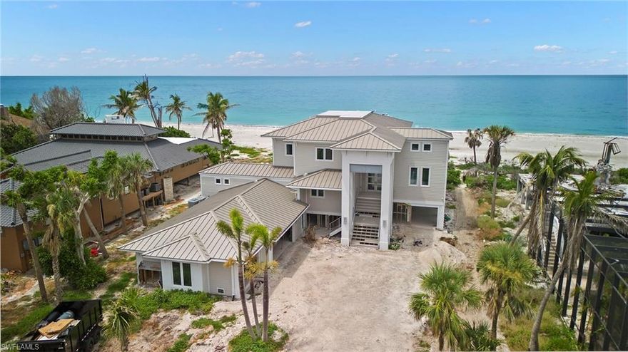 Great opportunity to acquire a Gulf-front property post-hurricane. Located deep in the residential district of West Gulf Drive, offering a cul-de-sac location, low-density beaches, and great backyard sunsets. In 2018, the current home was fully rebuilt over an existing structure that was closer to the water resulting in 180-degree views looking west down the beach. Unobstructed views of the Gulf from multiple rooms in the home including great room, kitchen, primary bedroom, and den/office. Expansive kitchen with dual islands, primary bath has walk-in shower, separate tub, and walk-in closets. Pool and spa area is private and overlooks the beach. The living area of the home did not flood and majority of the home's interior has been preserved including all bathrooms, kitchen, bedrooms, utility, and flooring. Contact listing agent for list of observed damage.