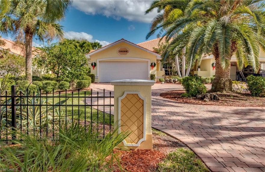 The best of everything! Maintenance free exterior but you own your own land and dock. 
This gorgeous home is offered turnkey!. It has a long paver driveway , 2 car garage with lush tropical landscaping. Private dock so you can have your boat behind your house.   The master suite is spacious and has lots of windows 
And a large walk in closet and separate soaking tub and shower.  There  is a great room with open kitchen with new granite