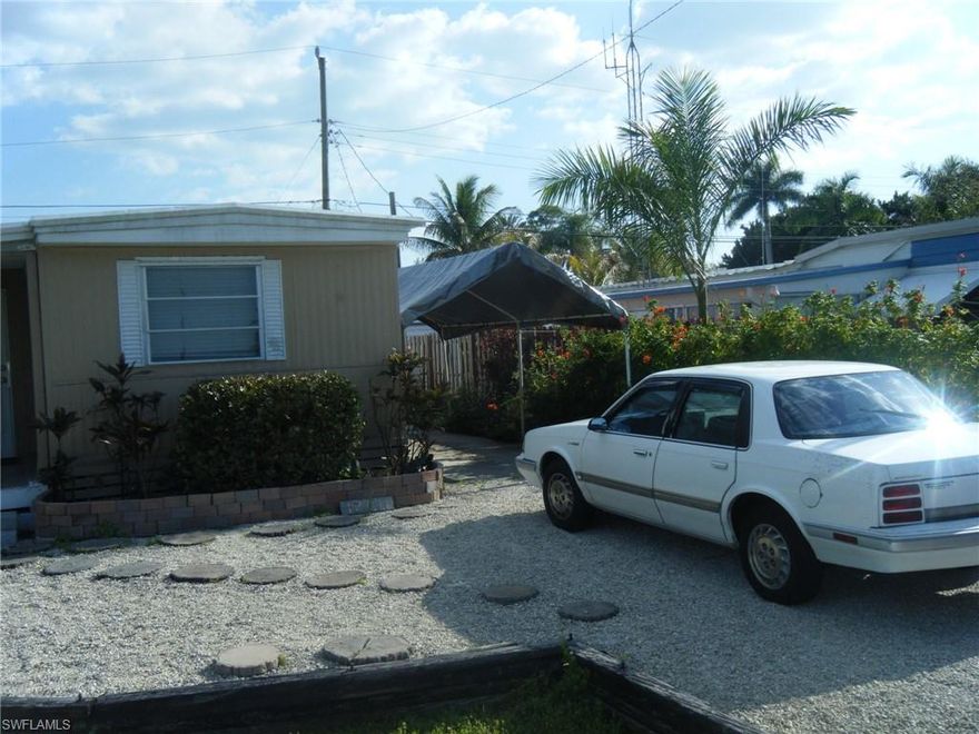 REDUCED: Great corner lot in Iona Gardens that is part of this sale. About 5 easy miles distance to Fort Meyer's beaches . Close to shopping and school. Church property across the street. Nice landscaped lot. One of the few parks in the area with NO Mandatory Age restrictions or HOA FEES. You can volunteer to join community pool/clubhouse for $325 a year. Unit has been a great rental property and has Tenant in place willing to continue renting. Seller disclosure available. AC system replaced in 2017.  Property is being sold AS-IS with right to inspect. Seller cosmetic repairs is not possible. Seller financing is possible with full price offer with down payment.