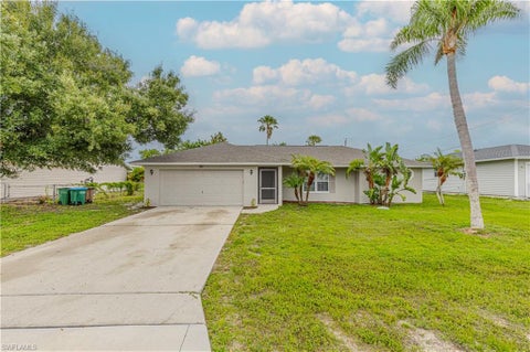 Photo of 321 NE 10th ST, CAPE CORAL, FL 33909 (MLS # 226028191)