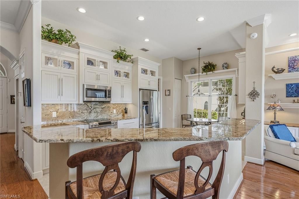 Photo of 8450 Mallards WAY, NAPLES, FL 34114 (MLS # 225082971)