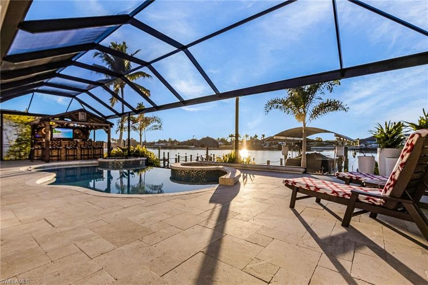 A unique opportunity to own a stunning Direct Gulf access pool home on Lupine lake!  Ultimate privacy (425' of water behind you) and a Front Row Seat to Breathtaking sunsets, Manatees, Dolphins, and dozens of species of fish and birds!   Directly connected to the NW Spreader which takes you out through Matlacha Pass to dozens of beaches, restaurants, and destinations like Ft. Myers, Sanibel, Cabbage Key, Siesta Key, and Key West!
Custom Renovation that’s BETTER THAN NEW!
The sellers have thoroughly upgraded this beautiful 2,276 s.f., 3 bedroom + den home literally from top to bottom, front to rear!  A complete list of the ~$485,000 of upgrades is attached, but here are a few…NEW Concrete tile Roof (2022),  NEW PGT Impact windows(JAN 2026),  NEW Storm Smart Hurricane automated lanai shutters(2022), a completely redesigned Kitchen with (2023) LG Appliances, Modern Lighting, Level 4 Quartz Countertops, Custom soft close cabinetry, and a Whole house R/O system!
Beautifully etched glass front doors, a soaring 15’ ceiling in the Great Room, New Flooring throughout, A Luxurious master suite with a beautiful walk thru shower, stand alone tub, and power shades.  You’ll run out of adjectives as you walk the home!
Entertain with A jaw dropping, HAND BUILT, Bambo Tiki Bar/Grill with Brazilian Hardwood, 2 Taps, and a Napoleon Grill/wet bar/fridge (2024)!  Enjoy those amazing sunsets in your beautiful, heated infinity pool! Lanai enclosure, fully automated Pool equip., Beautiful Travertine tile ALL NEW in (2023). In Addition, the pool was completely resurfaced in (2023)!  Honestly, you may not find a nicer Tiki Bar/Pool combination near this price in the Cape!
A NEW RUUD HVAC unit and a NEW FULLY PAID FOR (GPR 20,800 kWAC) Solar Panel System which came with a 25-yr warranty and generates ~120 percent of your power needs was added in (2023). BONUS! LCEC pays you for all the extra unused power you generate!
As if you needed another reason to call this home yours, it’s location on Lupine Lake is truly a Fisherman’s dream!  A few dozen different species can literally be caught right off your dock, some 4'+ in length. The 10K lb boat lift was fully serviced (2025), new Canopy and Canopy Infrastructure (2022), Composite Decking (2021), Pilings re-wrapped (2025), and there’s water and electric at the dock.  
The neighborhood is a quiet, safe, boating community, away from the hustle and bustle of DT.  Yet, the location is only minutes from driving South to Cape Coral or North to Punta Gorda. 18 mins from Punta Gorda Airport and 40 mins from RSW. Recently completed Crystal Lake Community Park, a 47-acre site which has commercial level fitness stations, walking paths, picnic shelters, is only a few min away. Crystal Lake Park is also the center of quite an effort to build an additional access route out to open water. There are Golf Courses and walking / biking paths nearby.
Recent Appraisal at $990,000.  Avail. on request.
Embrace the coastal lifestyle!