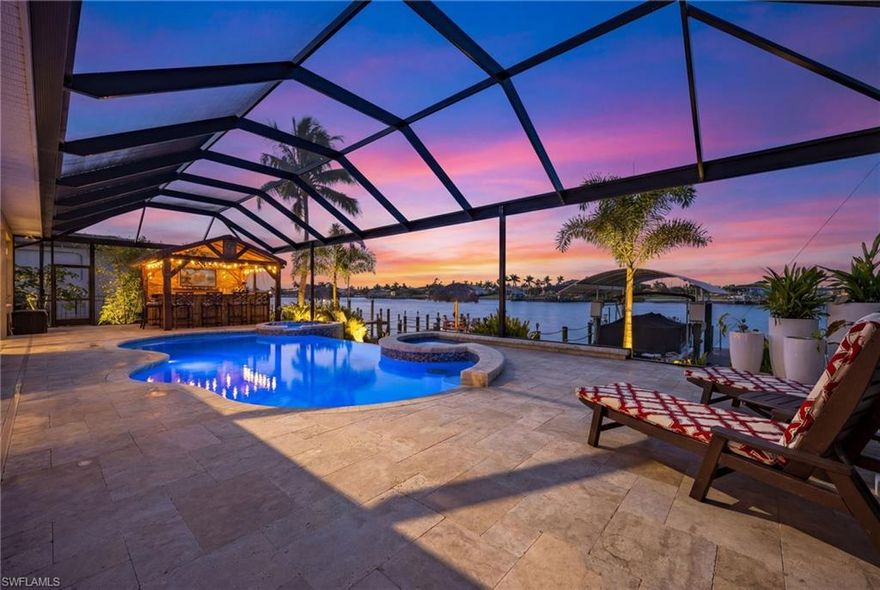 A unique opportunity to own a stunning Direct Gulf access pool home on Lupine lake!  Ultimate privacy (425' of water behind you) and a Front Row Seat to Breathtaking sunsets, Manatees, Dolphins, and dozens of species of fish and birds!   Directly connected to the NW Spreader which takes you out through Matlacha Pass to dozens of beaches, restaurants, and destinations like Ft. Myers, Sanibel, Cabbage Key, Siesta Key, and Key West!
Custom Renovation that’s BETTER THAN NEW!
The sellers have thoroughly upgraded this beautiful 2,276 s.f., 3 bedroom + den home literally from top to bottom, front to rear!  A complete list of the ~$485,000 in upgrades is attached, but here are a few…NEW Concrete tile Roof (2022),  NEW PGT Impact windows(JAN 2026),  NEW Storm Smart Hurricane automated lanai shutters(2022), a completely redesigned Kitchen (2023)with LG Appliances, Modern Lighting, Level 4 Quartz Countertops, Custom soft close cabinetry, and a Whole house R/O system!
Beautifully etched glass front doors, a soaring 15’ ceiling in the Great Room, New Flooring throughout, A Luxurious master suite with a beautiful walk thru shower, stand alone tub, and power shades.  You’ll run out of adjectives as you walk the home!
Entertain with A jaw dropping, HAND BUILT, Bambo Tiki Bar/Grill with Brazilian Hardwood, 2 Taps, and a Napoleon Grill/wet bar/fridge (2024)!  Enjoy those amazing sunsets in your beautiful, heated infinity pool! Lanai enclosure, fully automated Pool equip., Beautiful Travertine tile ALL NEW in (2023). In Addition, the pool was completely resurfaced at the same time!  Honestly, you may not find a nicer Tiki Bar/Pool combination near this price in the Cape!
A NEW RUUD HVAC unit and a NEW FULLY PAID FOR (GPR 20,800 kWAC) Solar Panel System which came with a 25-yr warranty and generates ~120 percent of your power needs was added in (2023). BONUS! LCEC pays you for all the extra unused power you generate!
As if you needed another reason to call this home yours, it’s location on Lupine Lake is truly a Fisherman’s dream!  A few dozen different species can literally be caught right off your dock, some 4'+ in length! The 10K lb boat lift was fully serviced (2025), new Canopy and Canopy Infrastructure (2022), Composite Decking (2021), Pilings re-wrapped (2025), and there’s water and electric at the dock.  
The neighborhood is a quiet, safe, boating community, away from the hustle and bustle of DT.  Yet, the location is only minutes from driving South to Cape Coral or North to Punta Gorda. 18 mins from Punta Gorda Airport and 40 mins from RSW. Recently completed Crystal Lake Community Park, a 47-acre site which has commercial level fitness stations, walking paths, picnic shelters, is only a few min away. Crystal Lake Park is also the center of quite an effort to build an additional access route out to open water. There are also Golf Courses and walking/biking paths nearby.
Recent Appraisal at $990,000. Avail. on request.
Embrace the coastal lifestyle!