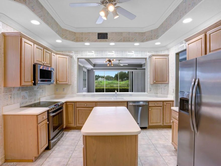 This coach home is located in the gated community of Kensington Golf & Country Club, which offers some of SWFL’s best golf, tennis, fitness and country club living while being close to beaches, shopping and entertainment. Kensington Country Club offers a range of membership options, but membership is NOT mandatory. This home offers 2 bedrooms plus a den with two bathrooms. The best part of this home is the view from your lanai of the 11th hole.