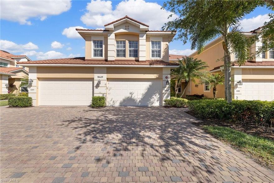 Move right into this well-maintained, nicely furnished, first floor condo with a golf course view.  All you need is your suitcases as this condo is being sold turnkey.  Enjoy the eastern facing lanai with newer no-seeum screening.  The kitchen has new stainless-steel appliances.  The refrigerator was replaced in January 2022, the range, microwave & dishwasher were all replaced in April 2022. Plus, the light cabinets with granite countertops, makes this kitchen a delight to cook in.  This condo has an optional enclosed room off the dining room with pocket doors that can be used as a home office or for guests as there is a pull-out sofa bed.  The two bedrooms plus den all have luxury vinyl flooring, no carpet in this home.  All the door trim & molding has been recently painted. The Champions, located in Lely Resort, has a wonderful clubhouse & pool, a great place to meet your neighbors.  The amenity rich Players Club & Spa is not required in this community but is available.