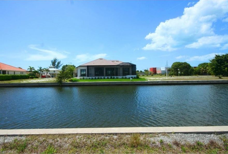 PANORAMIC water views with a HIGHLY DESIRED SW (SouthWest) facing rear exposure.  A very large home site is perfect for YOUR FUTURE DREAM HOME on the incredible PARADISE of Marco Island.  With 151 linear feet of seawall that allows plenty of room for a large dock & boat lift, jet skis, and so much more.  The original seawall has been replaced.   The AMAZING MARCO ISLAND LIFESTYLE awaits the very fortunate few.