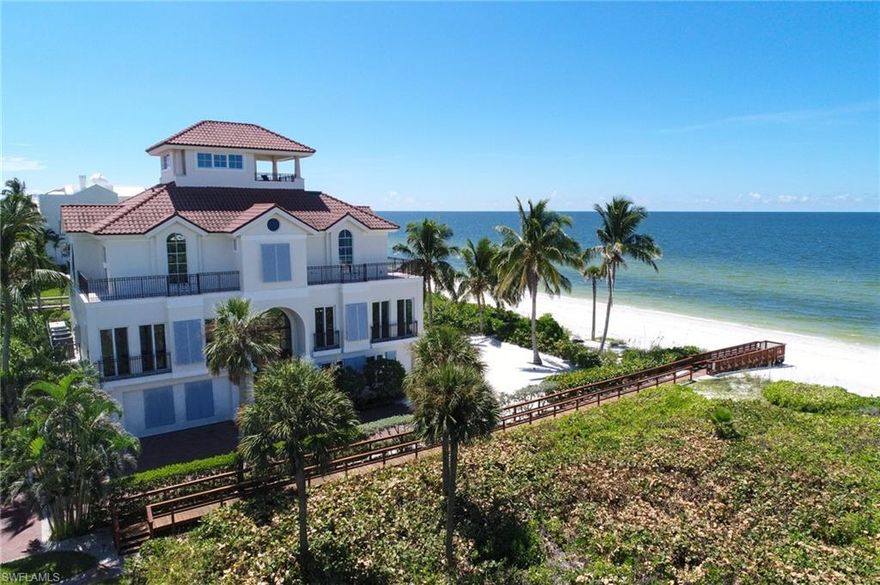 Presenting an incredibly rare "on the sand" direct beachfront Barefoot Beach home. This property is the only beach home that neighbors the villa beach preserve. This allows for unobstructed panoramic beach views from the back & down both sides of the home, without a direct neighbor on either side. Property was custom constructed utilizing original concrete pilings and was completed in 2010. Features include electric screens & shutters, full impact glass, & whole house generator. This home offers impressive curb appeal beginning w/a Gulf view driveway. The main level features an open layout w/large kitchen island, custom cabinets, exotic counter tops, & stone flooring. Lanai offers direct beach views & full fireplace. Living room is all views & features smart TV system hidden behind motorized art. The oversized den offers both casual TV viewing & fully retractable theater projection. The master looks down the southern part of the beach & features pass thru gas fireplace, soaking tub, shelves. Five guest suites & due to this unique lot even the back rooms have Gulf views. 4th floor offers dramatic Naples to Captiva views from the covered lanai.