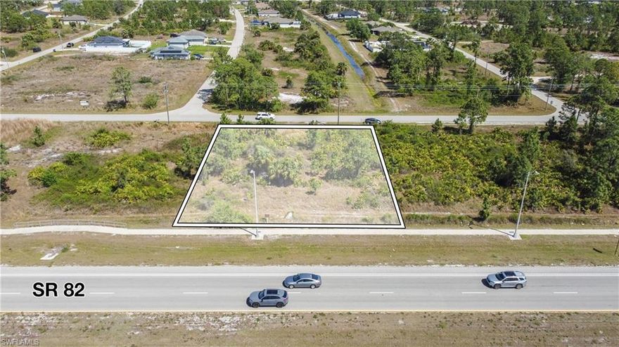 Fantastic opportunity to own an oversized lot zoned C-2 (Commercial), perfectly positioned just off a main road in Lehigh Acres, close to SR-82. This property is ready for development and holds immense value for investors and business owners looking to capitalize on the area's rapid growth. C-2 zoning allows for a wide variety of commercial uses, including retail stores, offices, restaurants, medical or professional buildings, service stations, and more — making this a highly flexible and desirable site. With its strategic location near a major corridor and high-traffic area, this lot offers outstanding visibility and accessibility. Whether you’re looking to develop now or hold as an investment, this is a rare chance to secure a prime commercial location in one of Southwest Florida's fastest-growing markets.