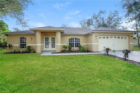 Single Family Residence in LEHIGH ACRES FL 1114 Dixie AVE.jpg