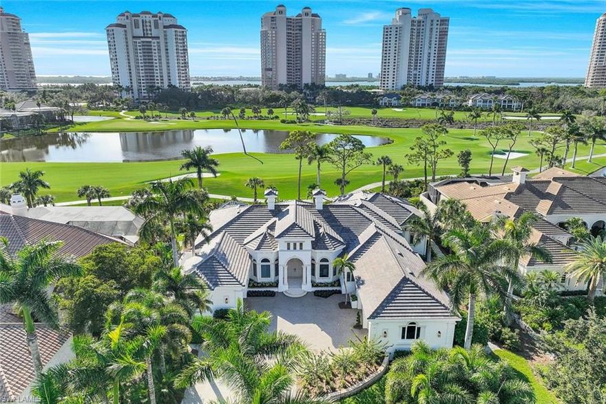 H12719 - 45 MINUTES OF BLISS! That is what the owners of this home call sunset EVERY SINGLE DAY. Stunning TRIPLE fairway, lake and sunset views as far as the eye can see. One of the most spectacular views in all of Bonita Bay. No need to renovate. This is a dream home! Original Builder Frey and Sons remodeled this home in 2019. Recent improvements include roof 2023, property perimeter fence 2023, lanai screens 2023, 2 new garage doors 2023, exterior house painted 2023, pool and spa equipment new in 2023. Pool resurfaced 2019. Hvacs 2019 and 2020. New outdoor kitchen finishes and appliances 2023. Thermador kitchen appliances, 6 burner propane gas range. All closets outfitted with custom built ins. Paver drive just resealed. Every bedroom has its own ensuite bath plus a powder bath inside and a dedicated pool bath outside! Move in ready. Bonita Bay is where Residents & nature connect with parks that include kayaking, bocce, pickleball, nature preserves, lakes, a private beach club, full service marina with restaurant & miles of dedicated walking paths..all included in your residency! Golf and Sports Memberships are optional.  Agents see remarks.