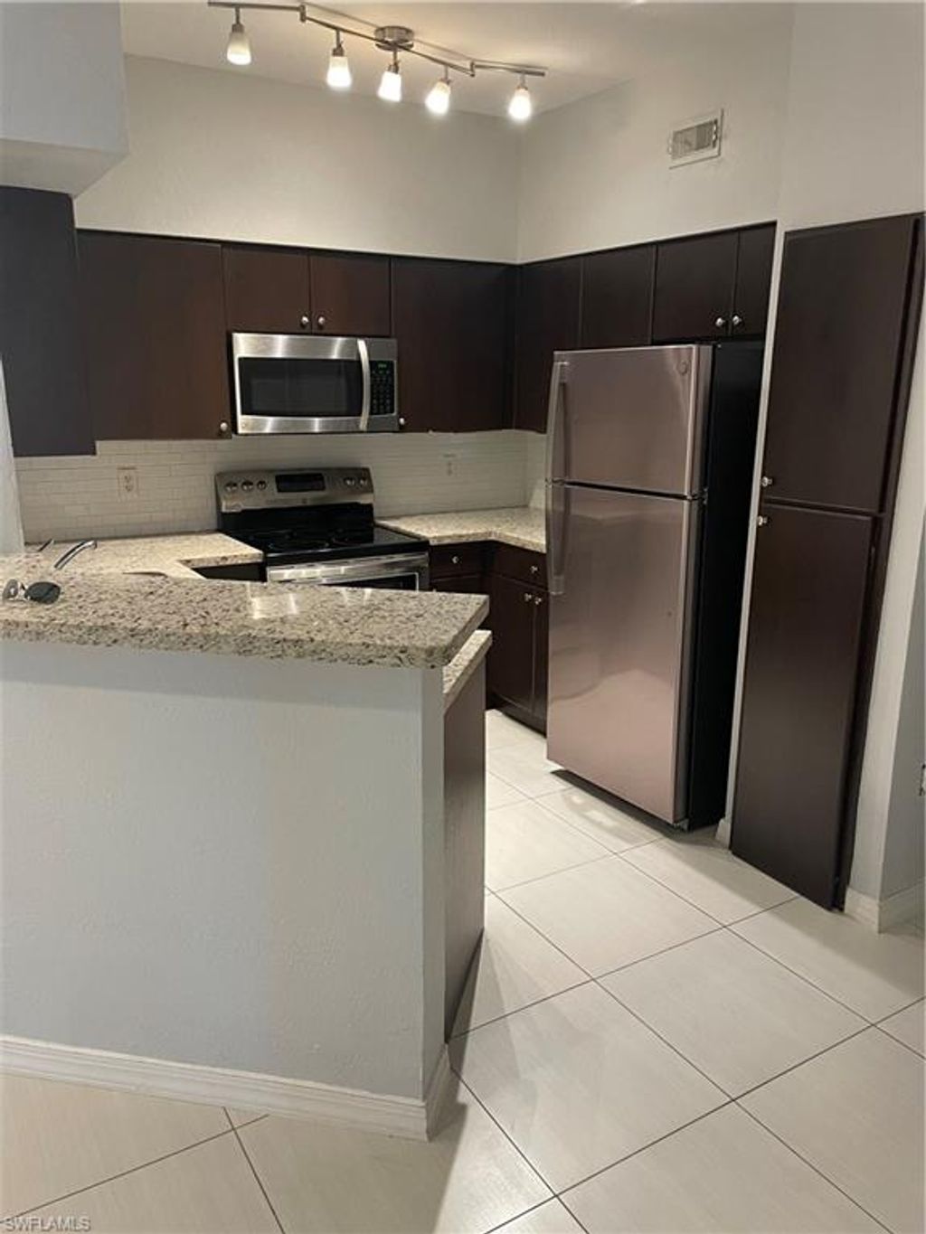 Photo of 23520 Walden Center DR #105, ESTERO, FL 34134 (MLS # 226020801)