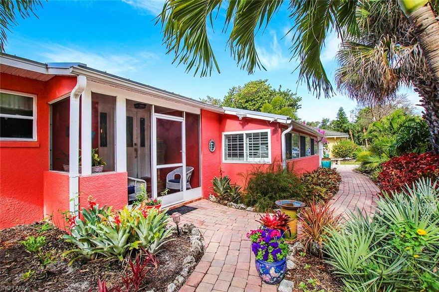 Very charming and affordable direct access canal home.  Perfect location.  Just a short bike ride to Beach and Restaurants in "Santiva' Enchanting Tropical landscaping wraps around the home for maximum privacy.  Accented by brick pavers.