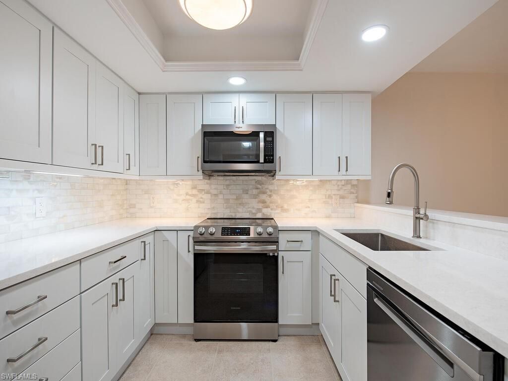 Photo of 6371 Pelican Bay BLVD #N3, NAPLES, FL 34108 (MLS # 225071181)