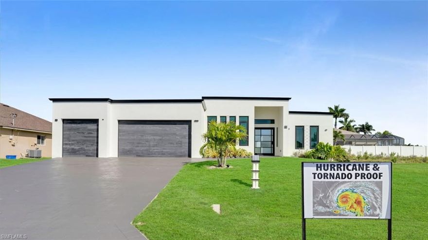 TORNADO AND HURRICANE PROOF! Often referred to as a modern BUNKER , this one-of-a-kind new construction home stands in a class of its own.This architecturally distinctive modern residence features a striking pivoting steel front door, expansive commercial-grade impact windows and sliding glass doors, a split floor plan, and soaring high-volume ceilings throughout. The gourmet kitchen is designed with premium, high-end appliances and refined finishes, all thoughtfully selected to deliver exceptional durability, safety, and luxury.

The solid concrete roof and full impact-resistant construction alone provide significant insurance advantages that many buyers actively seek. There is no need for evacuation—and with the installation of a proper generator, homeowners can confidently expect to remain operational after major storms without risking loved ones or personal belongings.

The home also features a spacious office that can easily be used as a guest bedroom. It offers abundant natural light thanks to its high-quality, commercial-grade windows. These windows are built to precise safety standards and are appropriately sized to allow emergency exit in the event of a fire.

Inside, the home showcases spectacular finishes, elegant porcelain tile flooring, and spacious, comfortable bathrooms featuring walk-in closets. The open and airy layout enhances both everyday living and entertaining.

Located in a beautiful and desirable neighborhood, the property is conveniently close to shopping, markets, and schools. Just minutes from the highly anticipated Seven Islands development, this home’s location further strengthens its long-term appeal and future value.