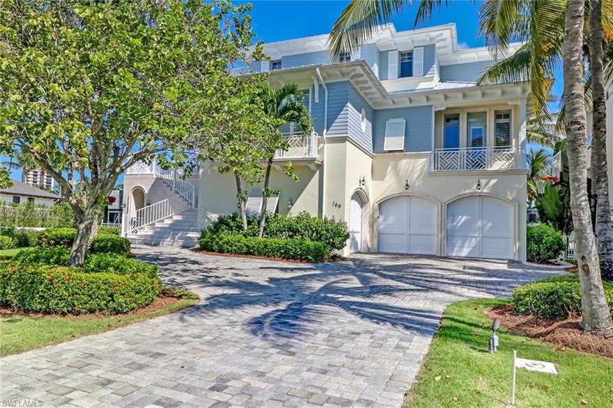 Designed and built by award-winning Stofft Cooney Architects and Toscana Homes this magnificent home is perfectly situated at the end of the canal on the Vanderbilt channel, short boat ride to the Gulf Of Mexico. Built to last with steel columns and impact glass, this exquisite home is featuring five bedrooms plus a den, four and a half bathrooms, three car garage and recreation room. Custom millwork includes crown moldings and tongue & groove cypress ceilings, private elevator, full house generator, three outdoor balconies, indoor bar, custom lighting and abundance of windows to enjoy Florida sunshine and the magnificent sunsets. The kitchen is a chef delight equipped with Sub-Zero refrigerator/freezer, Bosch dishwashers, Wolf gas cooktop, custom island and walk-in pantry. Luxurious master suite with private balcony, morning kitchen and master bath with marble flooring and custom walk-in shower. Outdoor living area includes exterior gas fireplace, pool, 360 degree infinity edge spa with glass tile. Brazilian hardwood dock with two boat slips easy access to the Gulf.