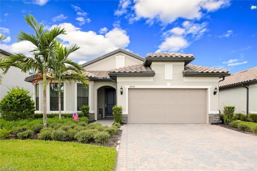 You’ll fall in love with this gorgeous home from the minute you pull into your pavered driveway and take in the sophisticated, colorful facade of stucco and stone. This 3 bed plus den, 2 bath home in the highly desirable neighborhood of The Place at Corkscrew has 2009 sq ft of living space with a roomy lanai where you’ll love watching the breathtaking sunsets over the stunning littoral preserve and still have room for the pool of your dreams. The open and airy great room shares the view and lets in plenty of natural light through a row of privacy windows and has plenty of space for living and dining. The striking kitchen features beautiful, white shaker cabinets with white countertops, ss appliances, and a large island perfectly situated for entertaining or just relaxing with your morning coffee. Imagine waking up in the generous main bedroom, then making your way to the spacious ensuite with dual sinks, a large glass-enclosed shower, and walk-in closet. A den and two guest bedrooms, with an additional, nicely appointed bathroom, round out this majestic home in this amazing neighborhood. The Place at Corkscrew also boasts a myriad of resort-style amenities to fit your every want.