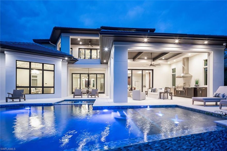 Stunning new construction home, built to the high standards of the renowned Knauf-Koenig Group, in the exclusive Moorings neighborhood with optional beach park membership.