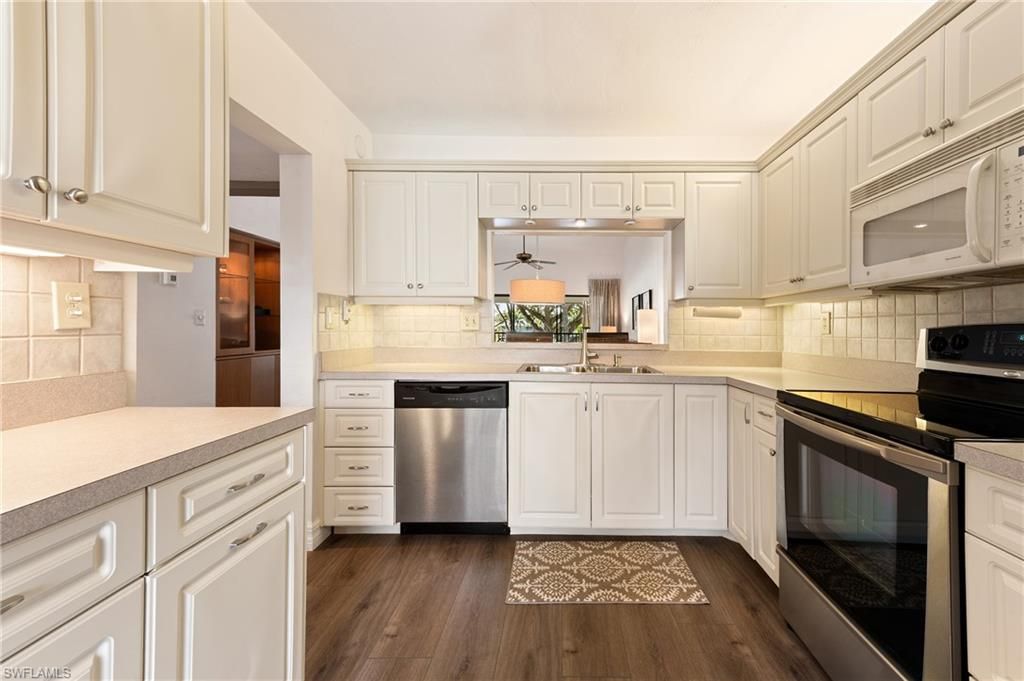 Photo of 1806 Kings Lake BLVD #203, NAPLES, FL 34112 (MLS # 225083442)