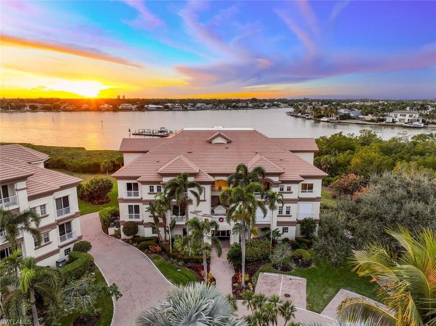 C13617 Rarely does a property fully embody the spirit of Naples living, but Admirals Watch does this and more, including the opportunity to obtain a Full Golf Membership. This beautiful bayfront, two story Penthouse with 4 Bedroom+ Den/Office, 5 Bathrooms, and 4426 sq ft of living space features expansive unobstructed 180 degree Naples bay views in the coveted & amenity-rich Windstar on Naples Bay community. Located just steps from the included 30 foot boat slip with lift, and Windstar's newly renovated Clubhouse, this waterfront property is the epitome of luxury living. Hurricane Impact Resistant Windows and Sliders showcase the sparkling bay views that adorn the Great Room while the elegant kitchen opens to a spacious living and entertaining area, including a custom wet bar and features volume ceilings. The first floor's magnificent Primary Suite includes a large custom walk-in closet and Spa-like bathroom with separate tub and shower. Completing the first floor is the Office with custom cabinetry and an additional secondary en-suite Bedroom. Retreat upstairs via the stairs or elevator, where you will find a second living area, incredible balcony & two large secondary en-suite bedrooms.
