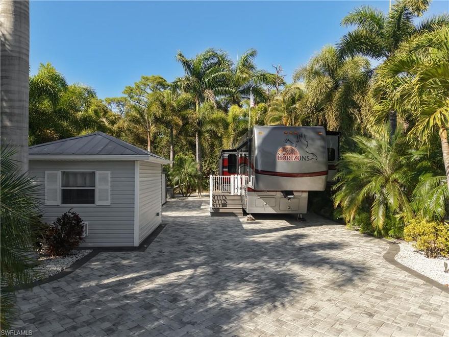Fall in love with this beautiful luxury lot in Cypress Woods RV Resort a luxury ownership resort in Fort Myers.  A full paver lot with lush landscaping composed of forty seven palm trees, exotic plants, marble rocks, gazebo with electronic shades, and stunning landscape lighting.  The fully finished accessory building with toilet, shower, television, microwave, dishwasher, murphy bed, sink, air conditioning, and plenty of cabinets gives you additional space to host guests.  This resort offers a Welcome Center with card room, fitness room, laundry, pool/hot tub and day spa.  The Town Center also offers card room, craft room, and large meeting room with catering kitchen for their large get togethers, and another pool/hot tub.  There are many amenities in the park, pickleball, tennis, shuffleboard, and much more.  Come and see what Cypress Woods has to offer along with what South West Florida has to offer, for your enjoyment.
