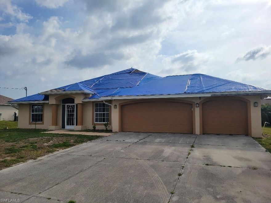 REHAB OR DEMOLISH AND REBUILD OPPORTUNITY! 3BR 3BA(2-1) 3 Car Garage Pool Home on Triple Lot in NW Cape Coral! Cash Only! Hazardous Conditions exist!