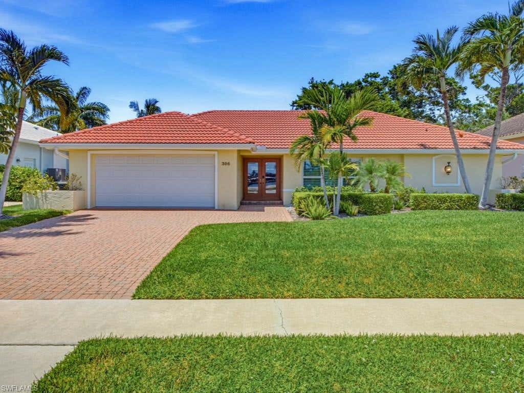 Photo of 306 Colonial AVE, MARCO ISLAND, FL 34145 (MLS # 226026909)