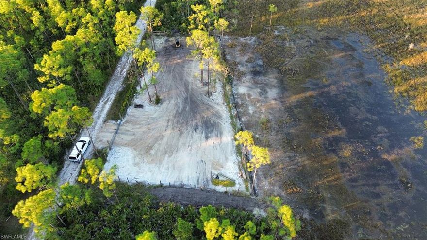 Take a look at this beautiful 2.5 acre parcel zoned AG. It offers privacy and many possibilities, but is also close to amenities such as shopping and dining, close to US 41. Located between Cape Coral North Fort Myers and a shot drive to Punta Gorda, Port Charlotte. Buyer to verify zoning and land use with local authorities. Seller does not have any surveys or wetland/environmental study. Buyer to do own diligence and verify boundaries and location of parcel.