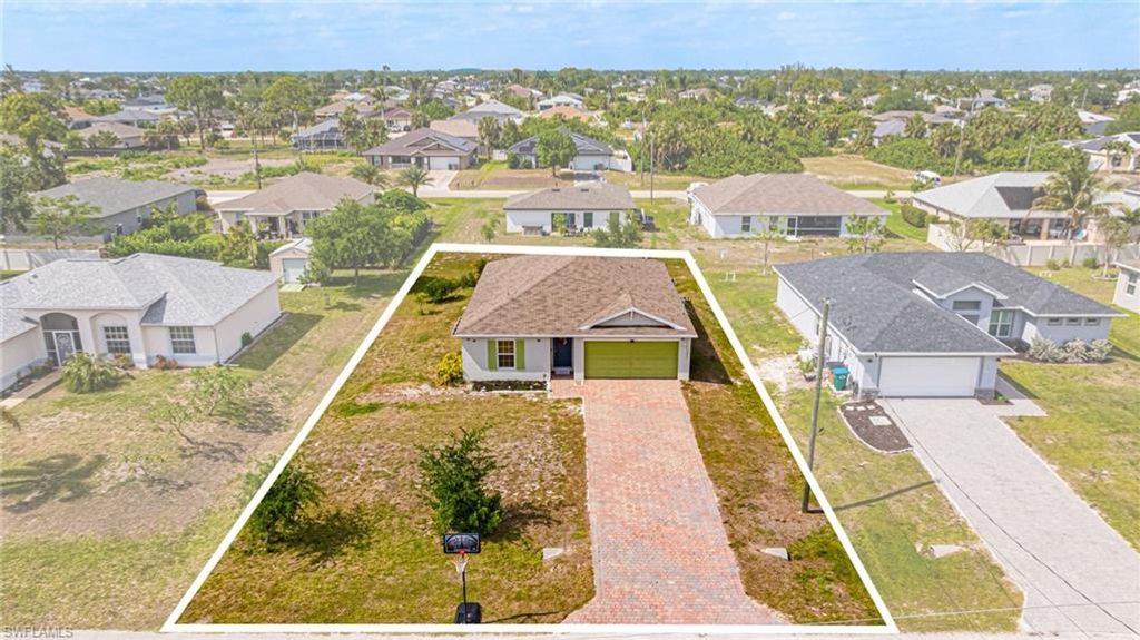 Photo of 1607 NE 35th LN, CAPE CORAL, FL 33909 (MLS # 226017037)