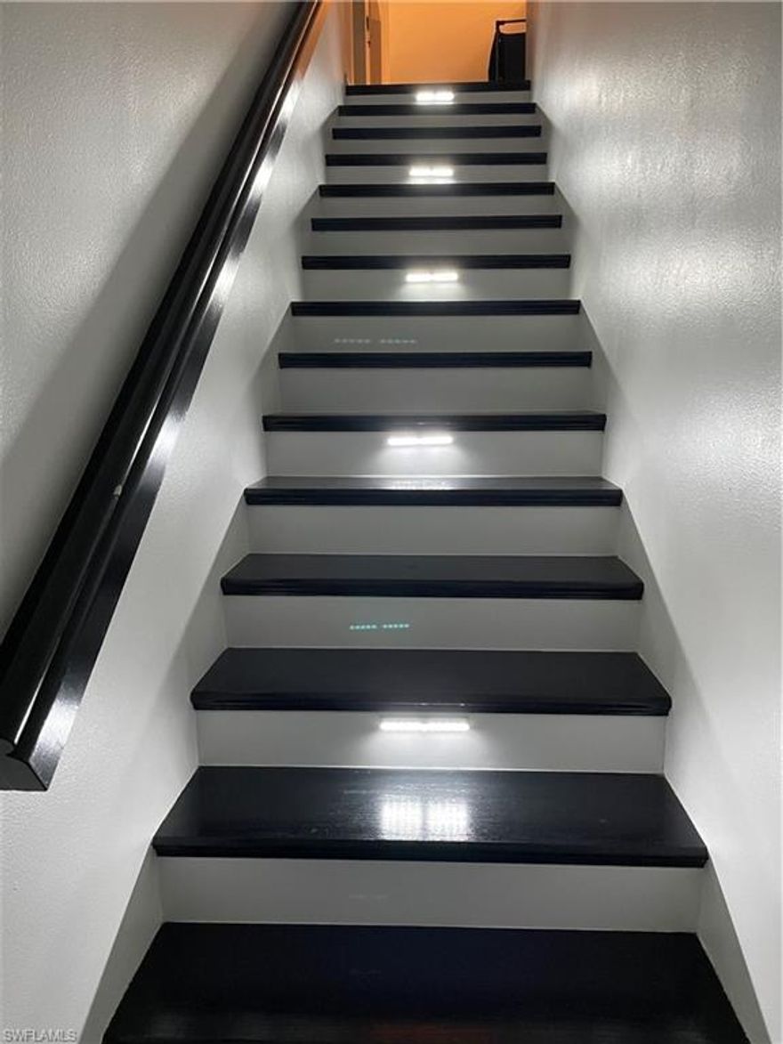 AMAZING OPPORTUNITY FOR a LUCKY BUYER! Only Unit currently available at Huntington Lakes. This  is the largest square footage offered and overlooks a private, landscaped area from your AIR CONDITIONED, TILED & GLASSED-IN LANAI. This 2 bedroom +Den, 2 bath home has been UPDATED and features custom mirrors, tile & laminate flooring, remodeled eat-in kitchen with tons of cabinet space, granite counters & tiled back splash, stainless steel appliances along with a built-in desk, remodeled Master bath with new vanity, granite counter, new ROOF, HURRICANE WINDOWS THROUGHOUT WITH LIFE-TIME WARRANTY, laundry room with extra storage cabinets & utility sink.  All 3 community pools have been resurfaced, new BBQ's & bocce courts along with repainted buildings & entry ways. Make this place your home TODAY!