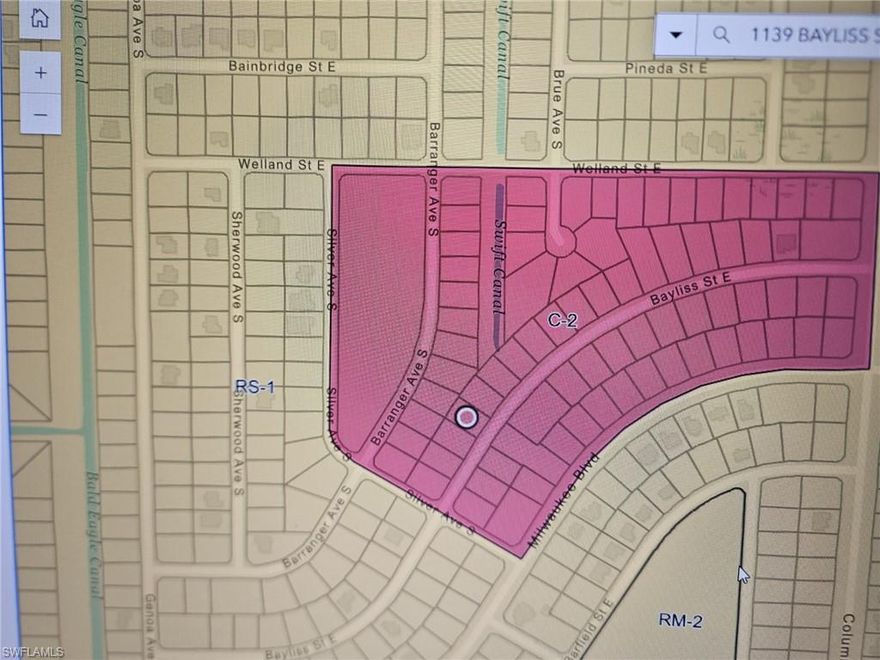 Lot is zoned C-2. A duplex is permitted on the property