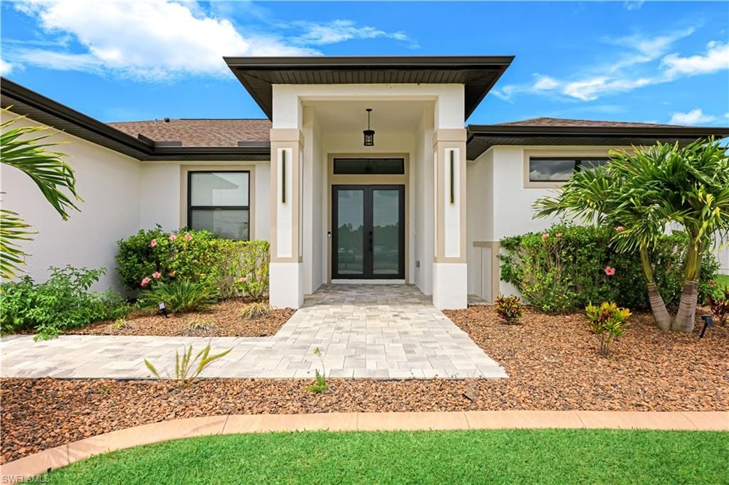 Photo of 1429 SW 24th ST, CAPE CORAL, FL 33991 (MLS # 226016875)