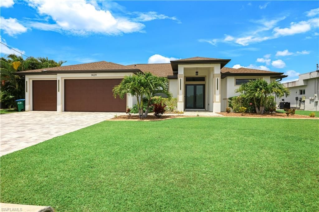 Photo of 1429 SW 24th ST, CAPE CORAL, FL 33991 (MLS # 226016875)