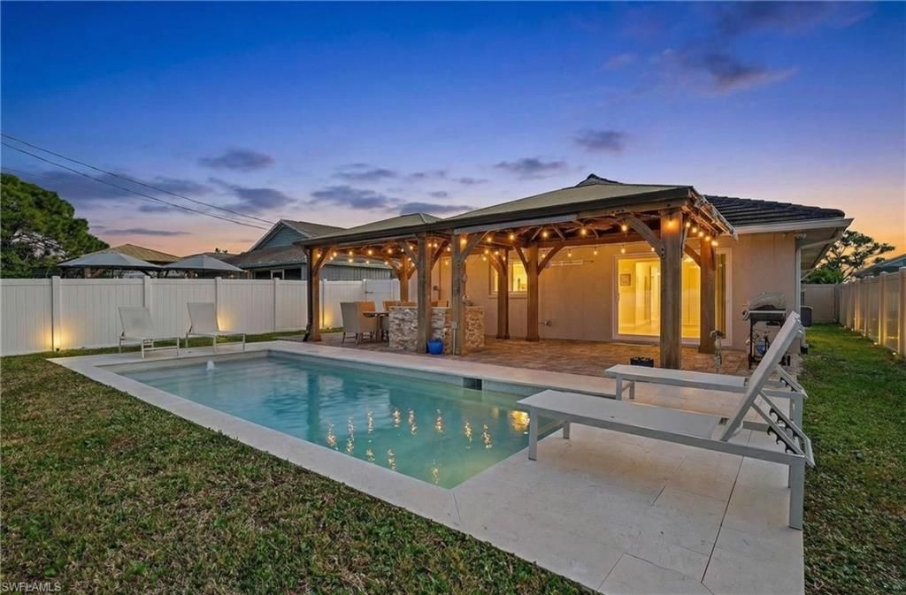 Photo of 523 107th AVE N, NAPLES, FL 34108 (MLS # 225082323)