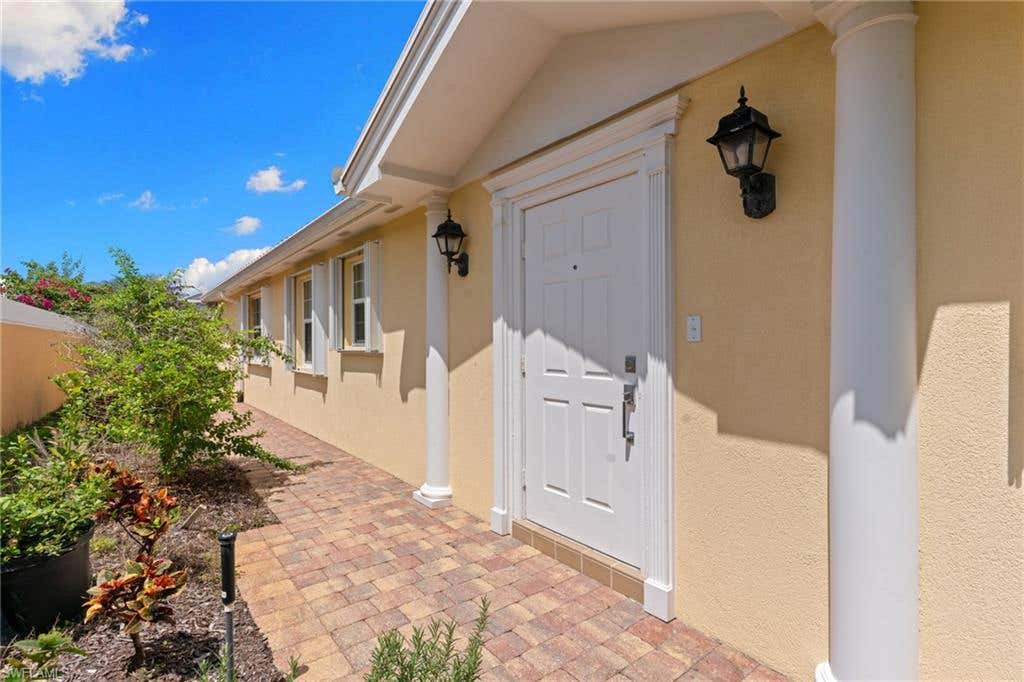 Photo of 7620 Rozzini LN, NAPLES, FL 34114 (MLS # 226027327)